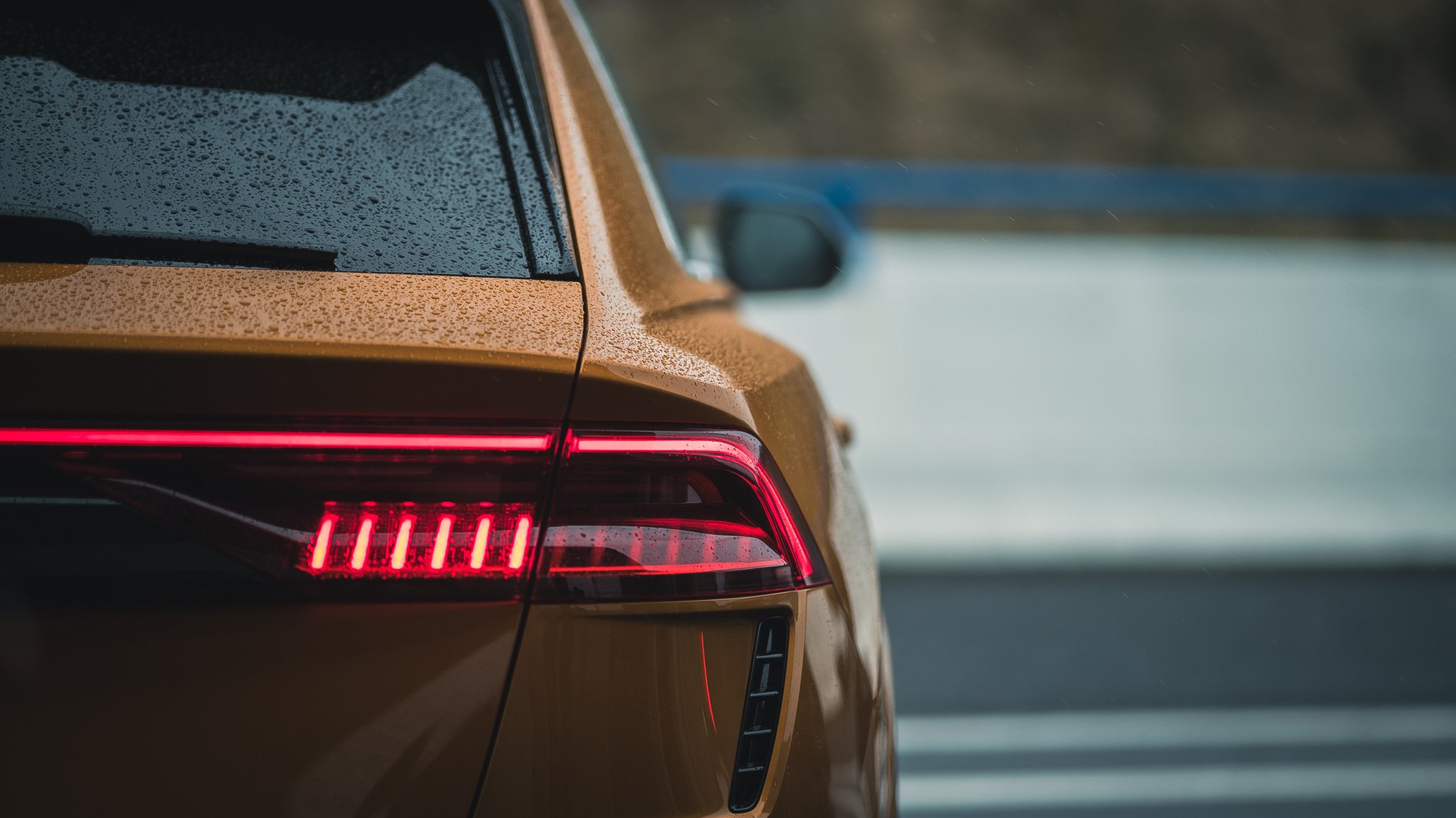 Red Headlights of a Yellow Car